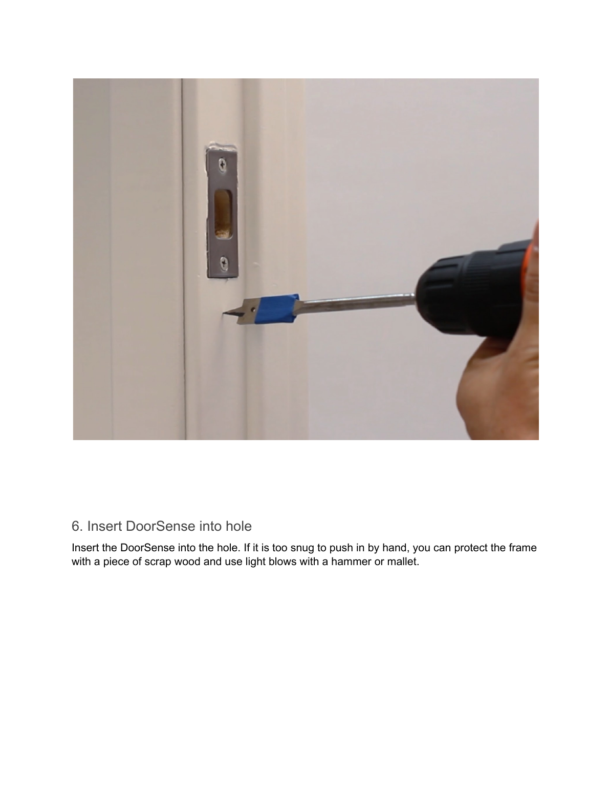 Drilling a hole in the door frame for flush mounting the DoorSense sensor